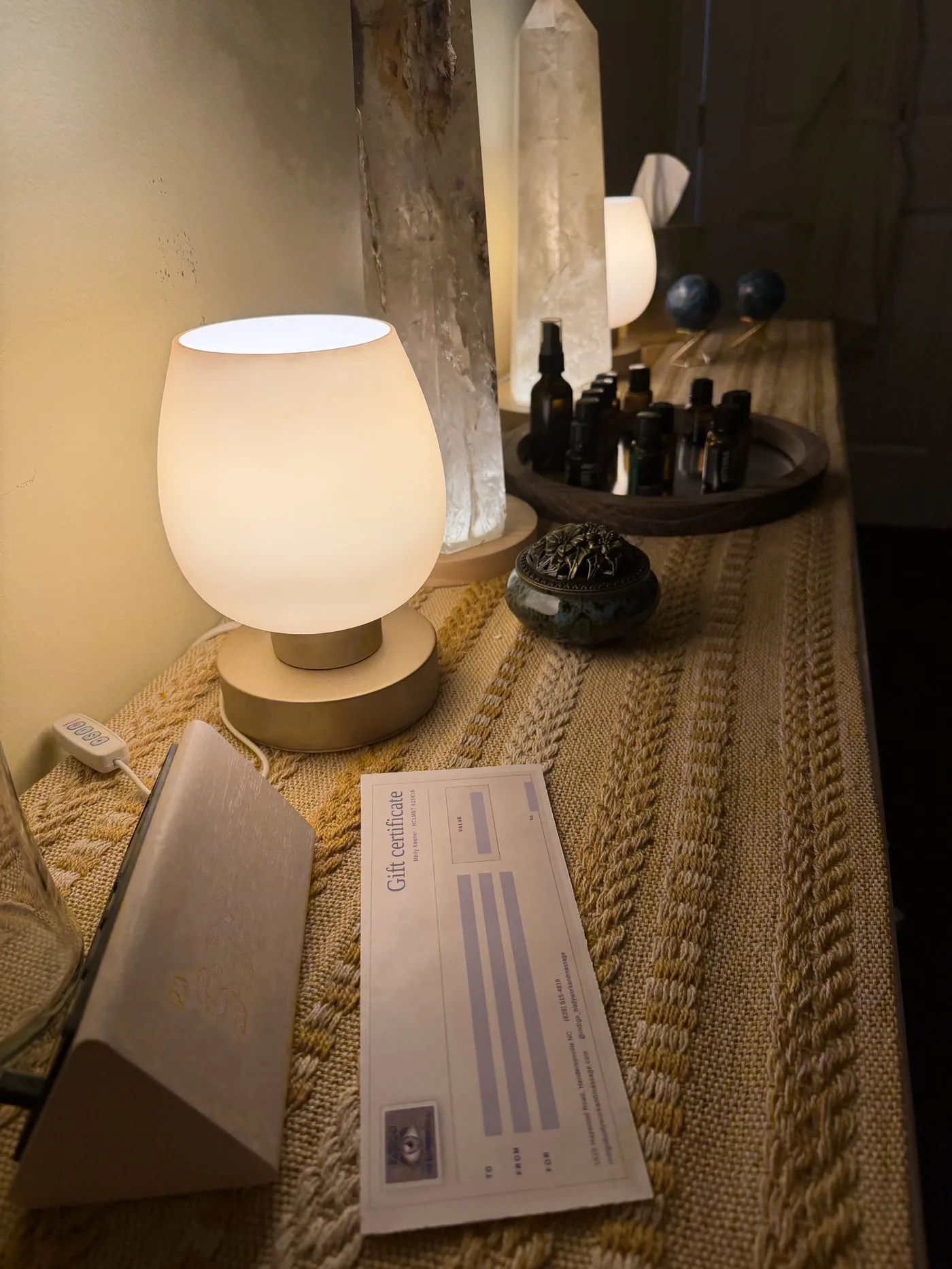 Lamp, crystal tower, essential oils, and an Indigo gift certificate
